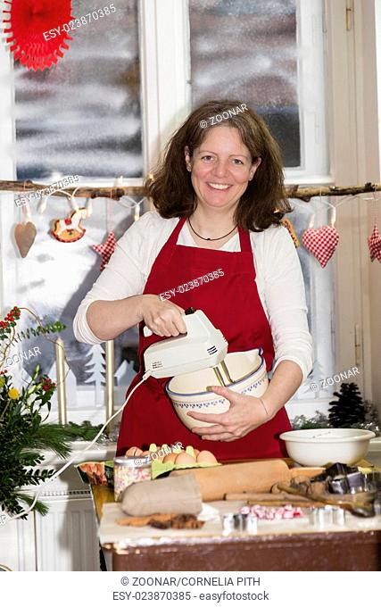 woman is baking cookie