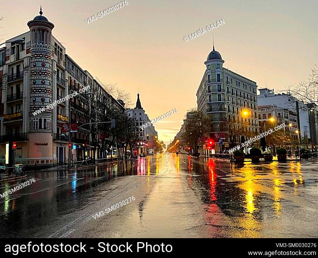 Alcala street at dawn in a rainy morning. Madrid, Spain
