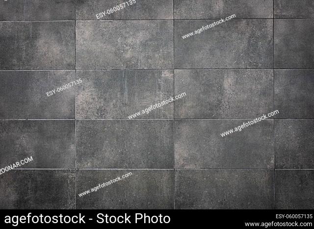 Modern grey stone wall outside texture background