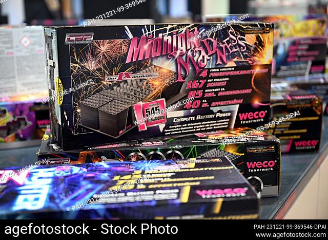 PRODUCTION - 19 December 2023, North Rhine-Westphalia, Eitorf: New Year's Eve rockets and fireworks are on display in the showroom of fireworks company Weco