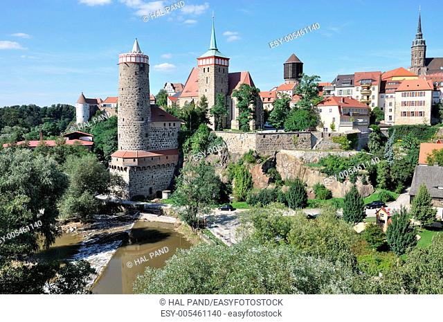 view of city center, bautzen, view of city center with ancient fortifications and city walls that surround houses, church, towers and lean over the river