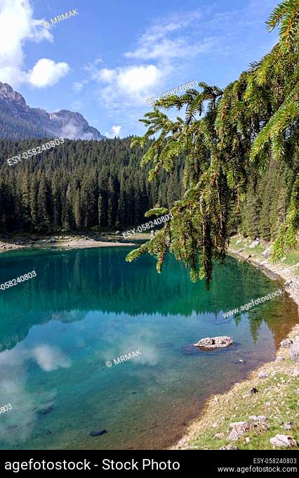 ??reflections on Lake Carezza karersee, Nova Levante, South Tyrol. The Lake Carezza is an italian UNESCO world heritage site