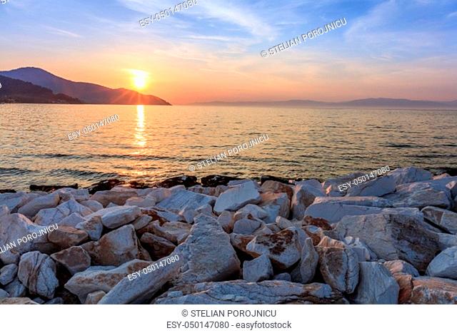 Sunset in Limenas harbour. Island of Thassos, Greece