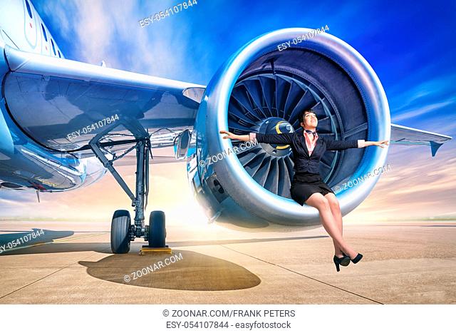 woman sitting in a jet engine