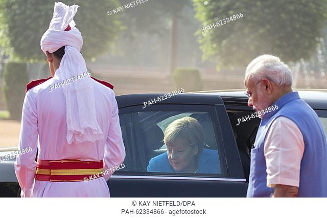 German Chancellor Angela Merkel is received by Indian Prime Minister Narendra Modi (R) in New Dehli, India, 05 October 2015