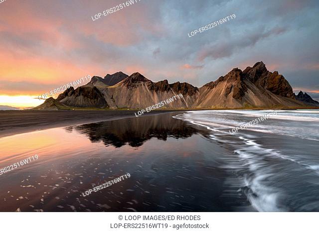 The Vestrahorn mountain reflected at sunset