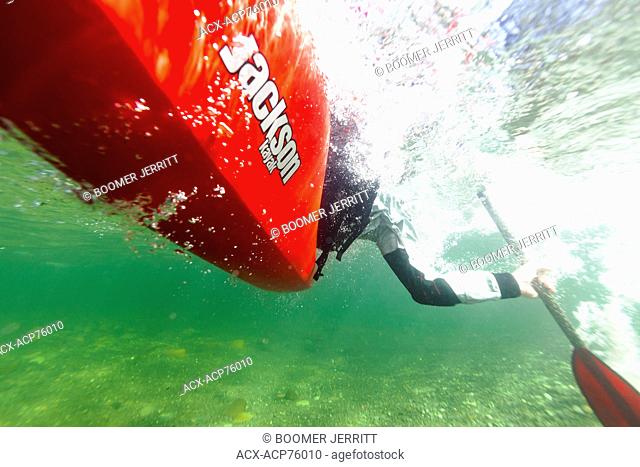 Underwater perspective of a Kayak roll in the Puntledge River, Courtenay, The Comox Valley, Vancouver Island, British Columbia, Canada