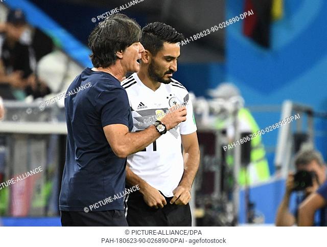 23 June 2018, Sochi, Russia - Soccer World Cup, Germany vs Sweden, Group Stage, Group F, 2nd matchday, Sochi Stadium: German head coach Joachim Loew speaks with...