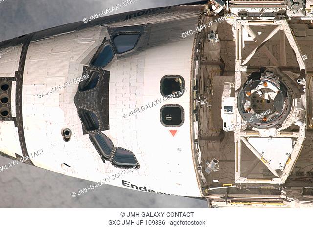 This image of the exterior of the Space Shuttle Endeavour's crew cabin is one of a series of survey photos recorded by Expedition 20 crew members as the shuttle...