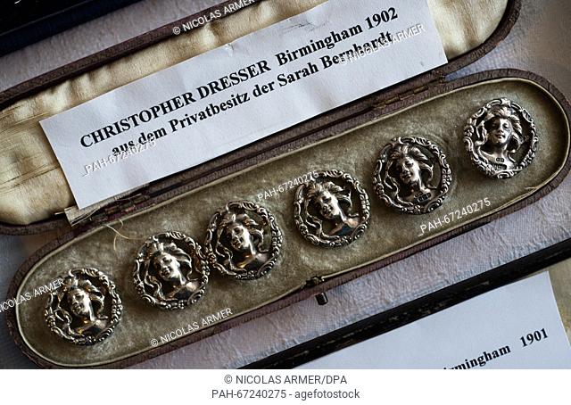 Various buttons from the private assets of late French actress Sarah Bernhardt pictured on a table in Kulmbach, Germany, 31 March 2016