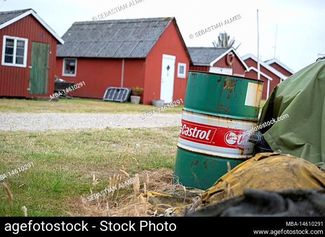 Oil barrel and fishing huts in Ringköping, Denmark