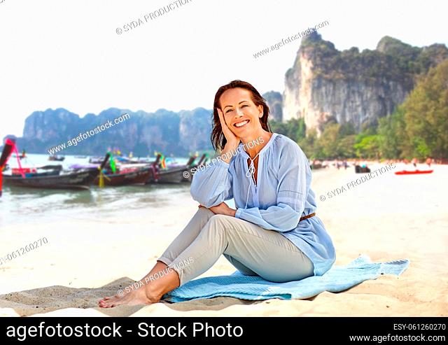 happy smiling woman on summer beach