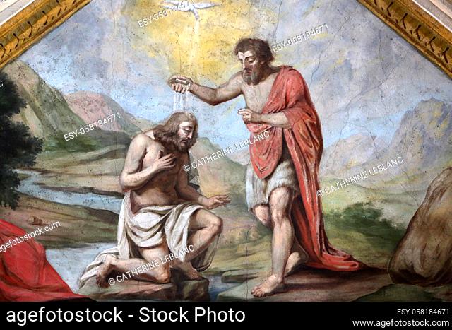 Baptism of Jesus Christ by John the Baptist. Painting. Saint Jacques collegiate church. Sallanches. Haute-Savoie. Auvergne Rhône-Alpes. France. Europe