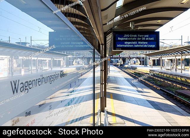 27 March 2023, Rhineland-Palatinate, Mainz: A display board on the platform at Mainz Central Station indicates the warning strike
