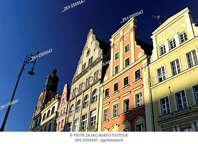Buildings at Market Square with the tower of Saint Elizabeth's Church in background in Wroclaw, Poland