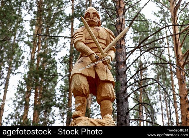 RUSSIA, IRKUTSK REGION - MAY 13, 2023: A participant’s work is on display at the 10th Lukomorye Na Baikale international wood sculpture festival