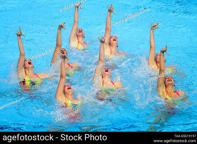 RUSSIA, KAZAN - DECEMBER 10, 2023: Members of Team Belarus perform their group technical routine during the Synchronised Swimming Federation Cup at the Palace...
