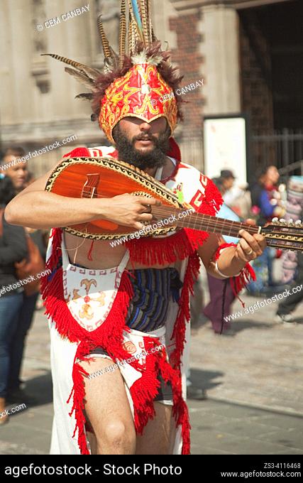 Indigenous people wearing traditional dress performing during the celebrations in front of the Basilica on the festival day dedicated to Our Lady of Guadalupe...