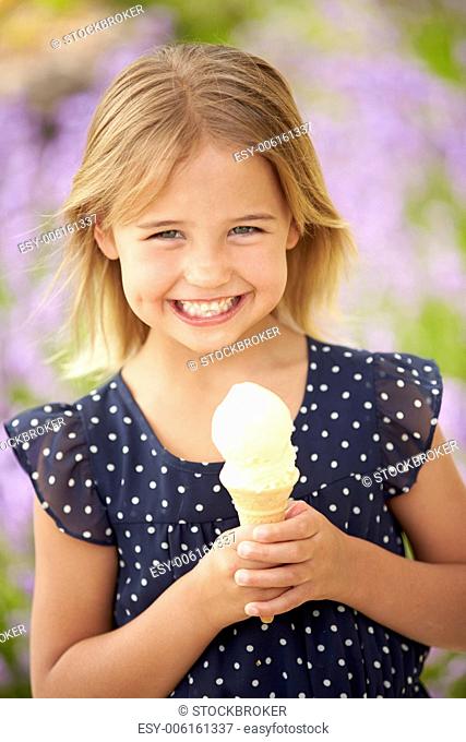 Young Girl Eating Ice Cream Outdoors