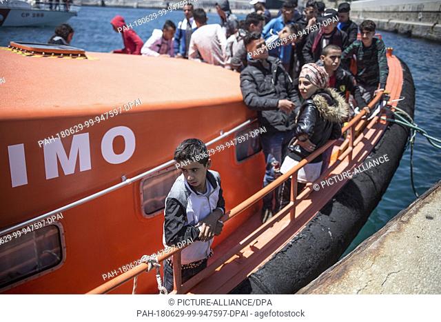 African migrants arrive after they have been rescued on high seas on the Strait of Gibraltar in Tarifa, Spain, 29 June 2018. Photo: Javier Fergo/dpa