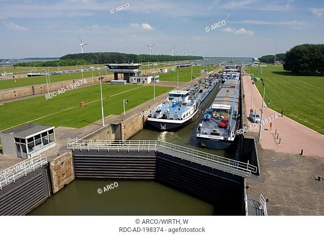 Cargo ships in floodgatte Volkeraksluizen, Willemstad, Noord Brabant, Netherlands