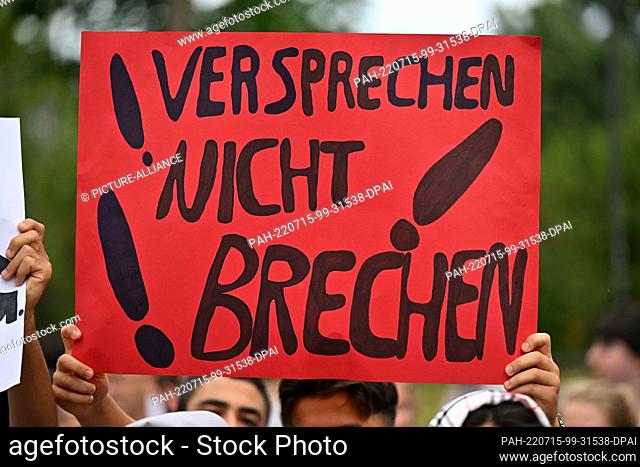 13 July 2022, Thuringia, Erfurt: ""Don't break promises"" is written on the poster displayed in front of the Thuringian state parliament during a protest by...