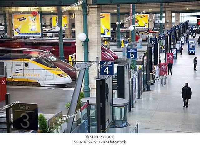 Eurostar trains and platforms with passengers in Gare du Nord Paris France Europe EU