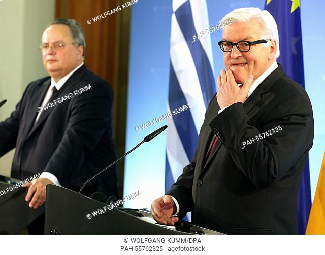 German Minister of Foreign Affairs Frank-Walter Steinmeier (R) and his Greek counterpart Nikos Kotzias speak to journalists before talks at the Foreign Ministry...