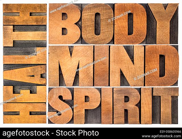 health, body, mind and spirit word abstract - a collage of isolated text in vintage wood letterpress printing blocks, holistic approach to wellbeing concept
