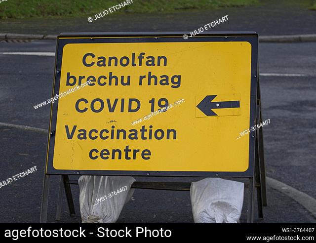 Covid-19 testing and vaccination centre with bilingual signs in Welsh and English at the campus of Aberystwyth University , Ceredigion, Wales, UK