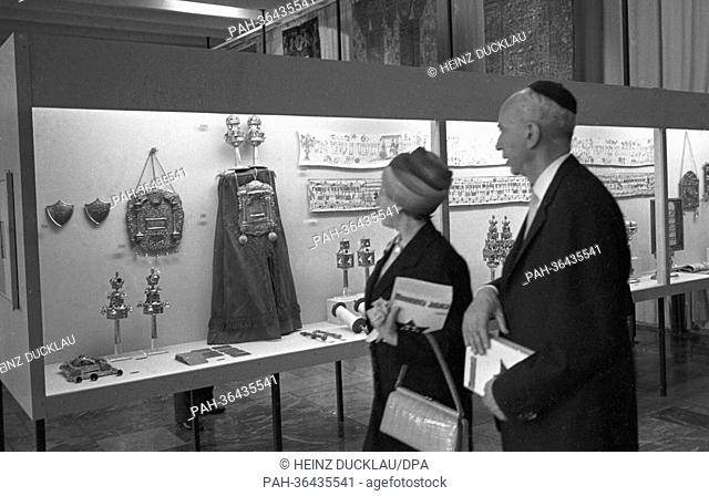 View of the exhibition with two Jewish visitors. On 14 October 1963, the President of the Bundestag Dr Gerstenmaier opened the exhibition ""Monumenta Judaica -...