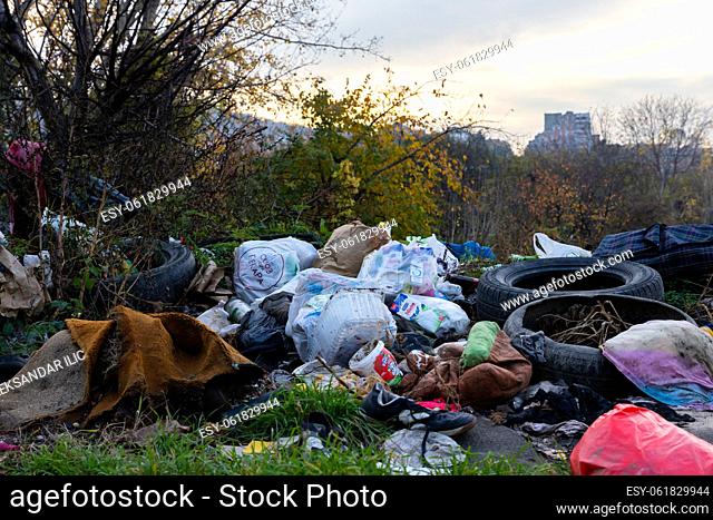 Belgrade, Serbia - November 17, 2022: Garbage and trash at Landfill scatered all over the place in Belgrade, Serbia