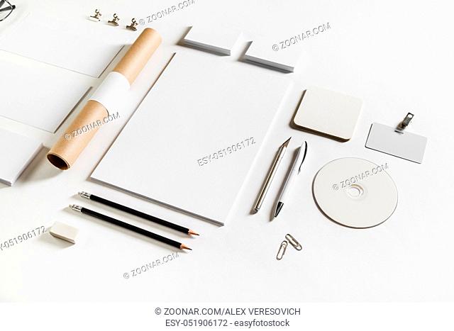 Photo of blank stationery set on white paper background. Corporate identity mockup. Responsive design template