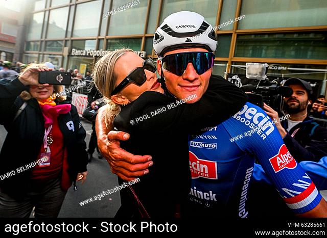 Dutch Mathieu van der Poel of Alpecin-Deceuninck and his girlfriend Roxanne celebrate after winning the 'Milano-Sanremo' one day cycling race