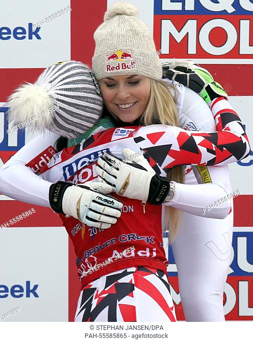 Gold medal winner Anna Fenninger of Austria is hughed by bronze medal winner Lindsey Vonn of U.S. (R) after the ladies Super-G at the Alpine Skiing World...