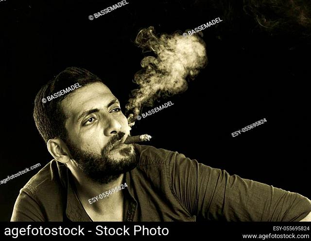 Beard Smoking Cigar (page 3) - Only Creative Stock Images, Photos & Vectors  | agefotostock