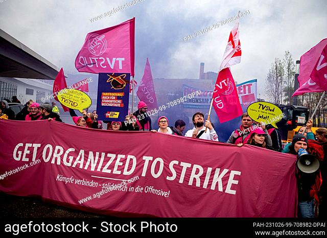 26 October 2023, Berlin: Members of TVStud demonstrate before the start of collective bargaining for the public service of the federal states on Scharounplatz...