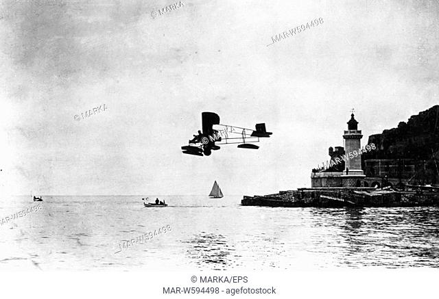 seaplane Mario Calderara flying in La Spezia near the port, 1912