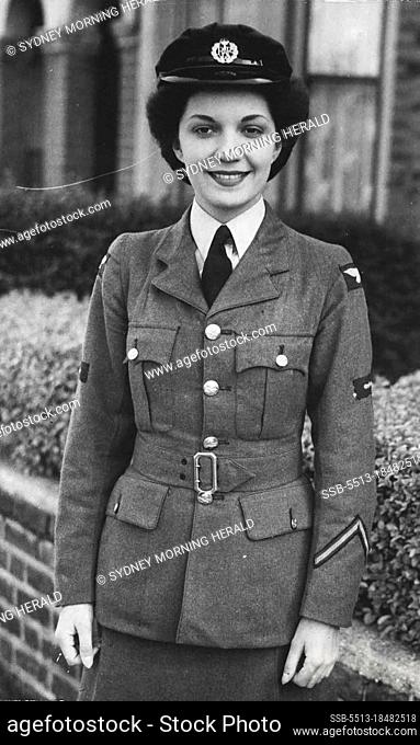 Air Ministry Search Revels Pin-up Girl - Leading-aircrafts woman Poggy Burkett at her Enfield home. A large and sudden increase has occurred in the mail of...