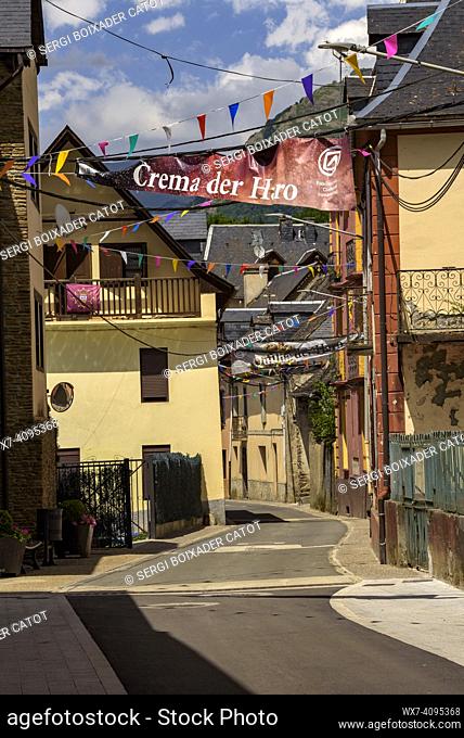 Village of Les decorated for the festival of Sant Joan due to the summer solstice (Aran Valley, Lleida, Catalonia, Spain, Pyrenees)