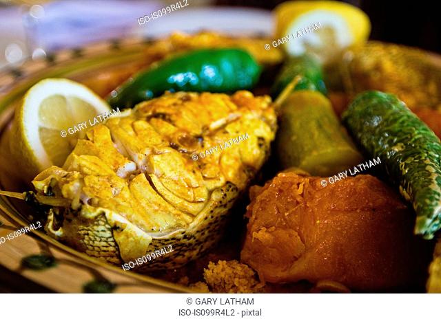 Tunisian restaurant dish of grouper with vegetables, Djerba