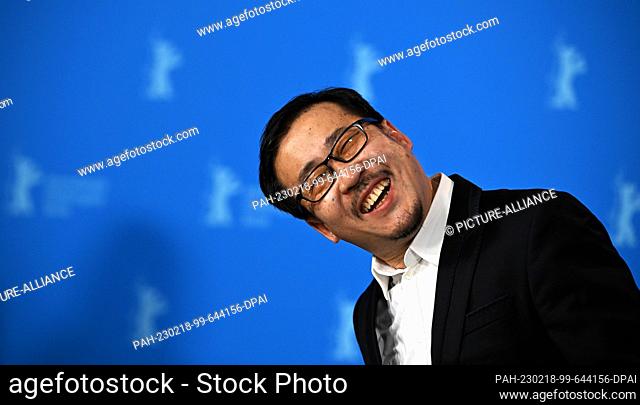 18 February 2023, Berlin: Wang Hongwei, actor, stands in front of the photo wall during the photo session for the film ""Bai Ta Zhi Guang"" (The Shadowless...