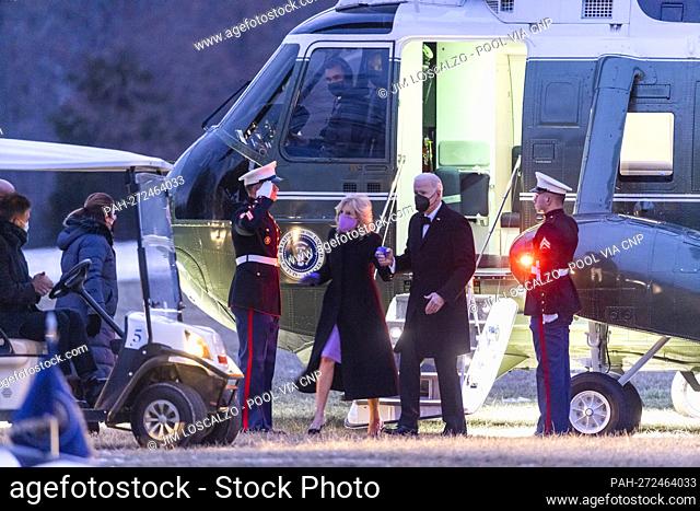 US President Joe Biden and First Lady Jill Biden walk off Marine One as they arrive at George Washington’s Mount Vernon home to attend the National Governors...