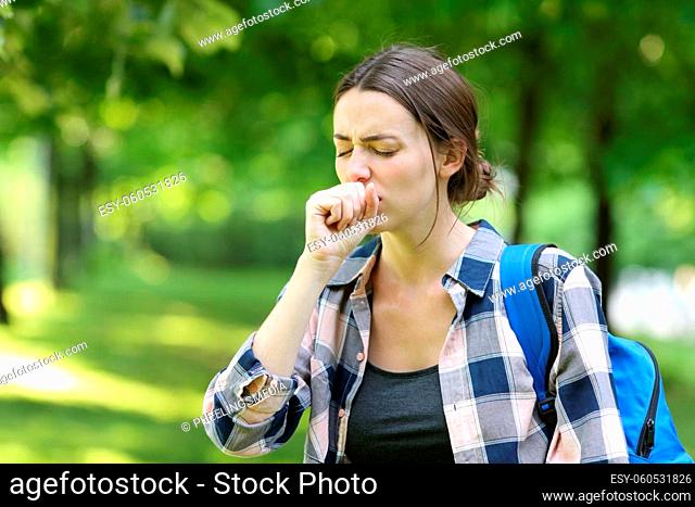 Ill student coughing in a campus