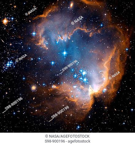 Near the outskirts of the Small Magellanic Cloud, a satellite galaxy some 200 thousand light-years distant, lies the young star cluster NGC 602  Surrounded by...
