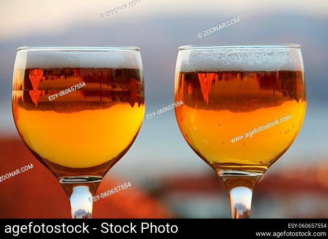 Two glasses of beer summer evening vacation relax concept