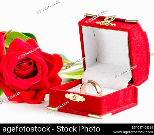 The wedding concept with rings and roses