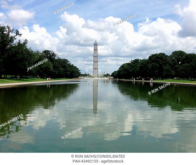 Washington Monument from the western edge of the Reflecting pool showing the scaffolding in place, in Washington, D.C., USA, 14 July 2013