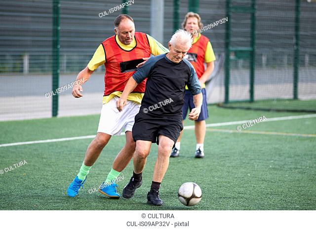 Men playing football