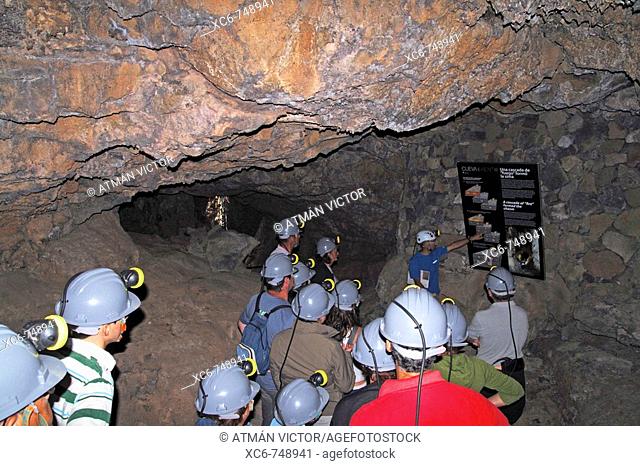 Visitors in the Cueva del Viento-Sobrado lava tube, Tenerife, Canary Islands, Spain